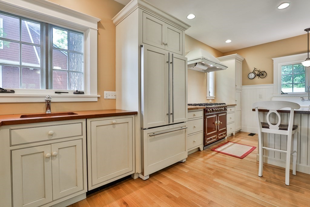 14 Still River Road Harvard, MA 01451 - Photo 12 of 39 a kitchen with cabinets and wooden floor
