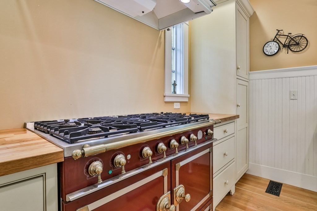 14 Still River Road Harvard, MA 01451 - Photo 13 of 39 a stove top oven sitting inside of a kitchen