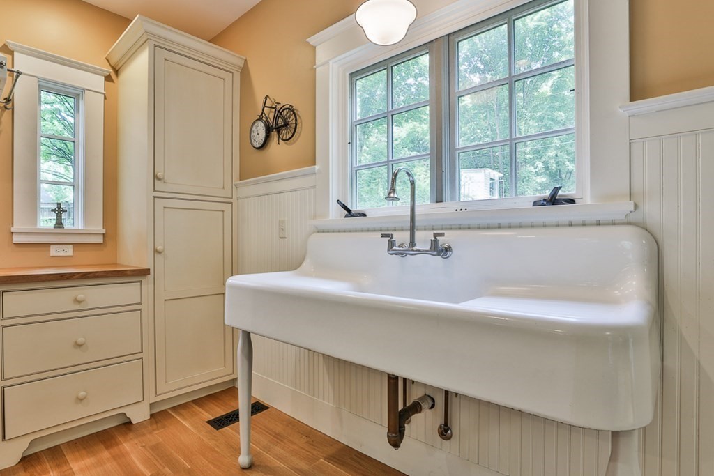 14 Still River Road Harvard, MA 01451 - Photo 14 of 39 a bathroom with a bathtub and a window