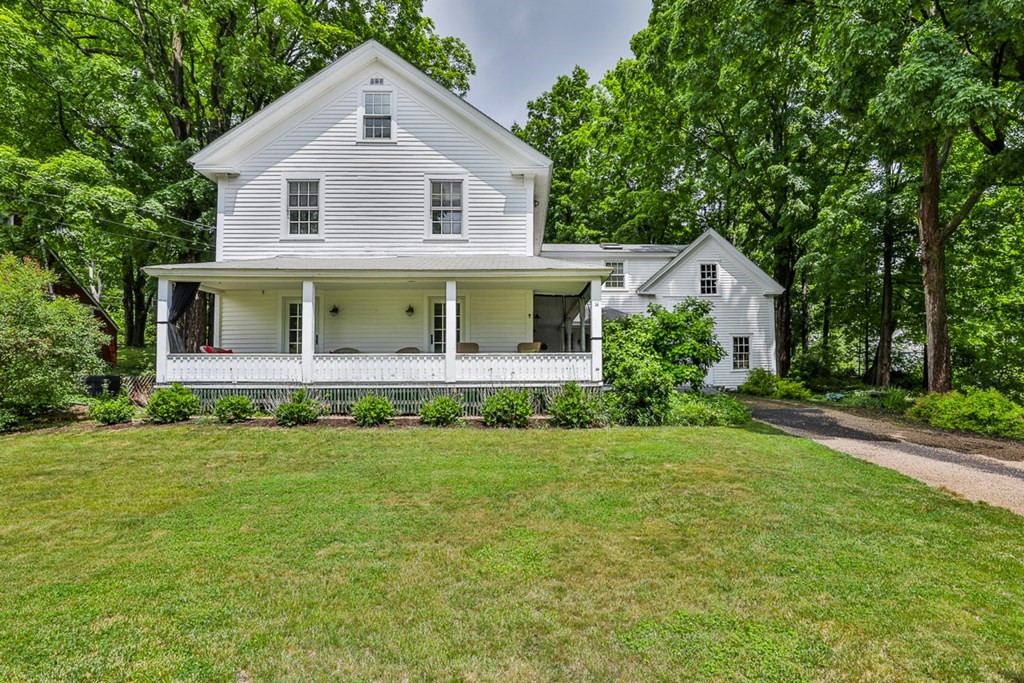 14 Still River Road Harvard, MA 01451 - Photo 2 of 39 a front view of house with yard and green space