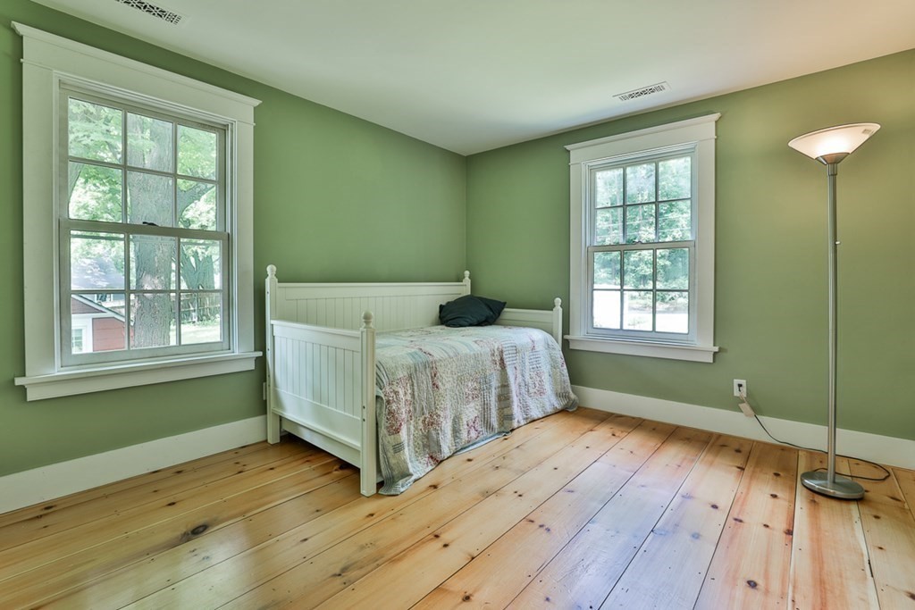 14 Still River Road Harvard, MA 01451 - Photo 23 of 39 a bedroom with a bed and a window