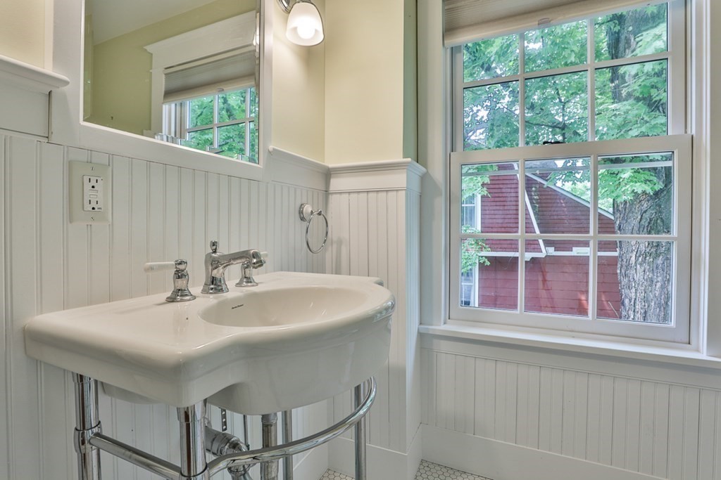 14 Still River Road Harvard, MA 01451 - Photo 27 of 39 a bathroom with a sink and a window