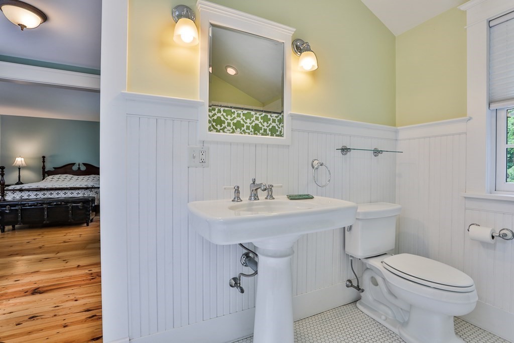 14 Still River Road Harvard, MA 01451 - Photo 35 of 39 a bathroom with a sink a toilet and mirror