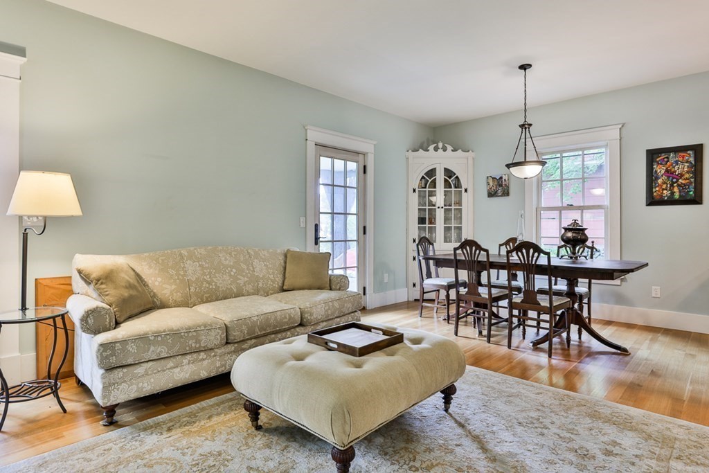 14 Still River Road Harvard, MA 01451 - Photo 7 of 39 a living room with furniture a dining table and a wooden floor