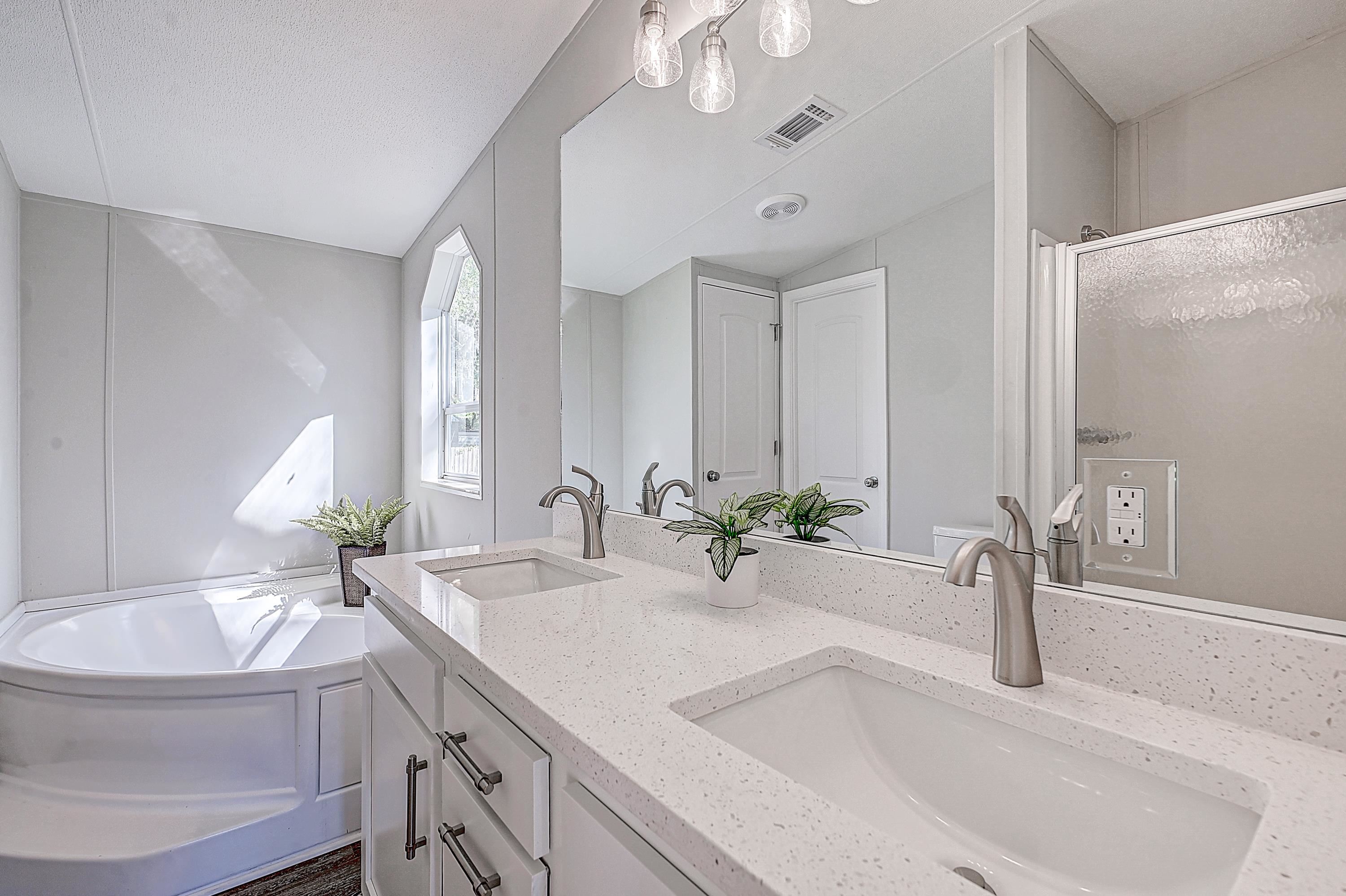 800 Oakes Avenue St. Augustine, FL 32084 - Photo 20 of 26 a bathroom with a sink and a mirror