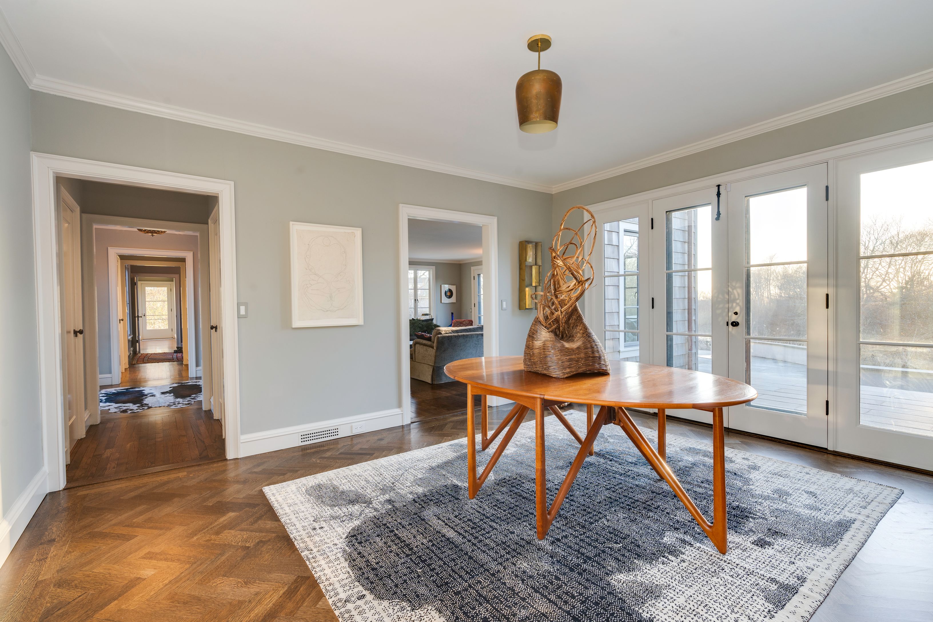 153 Egypt Lane East Hampton, NY 11937 - Photo 15 of 47 a view of a livingroom with furniture wooden floor and windows