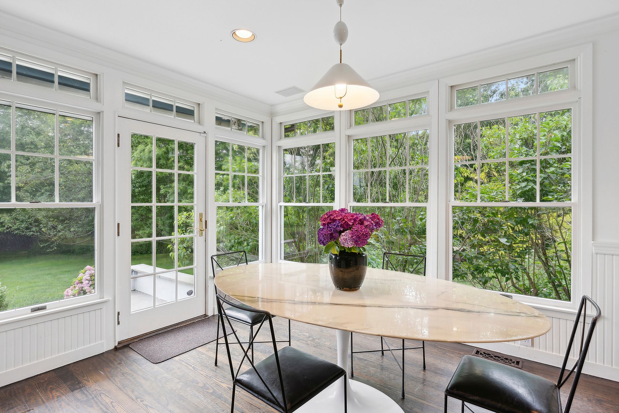 153 Egypt Lane East Hampton, NY 11937 - Photo 19 of 47 a view of a dining room with furniture window and outside view