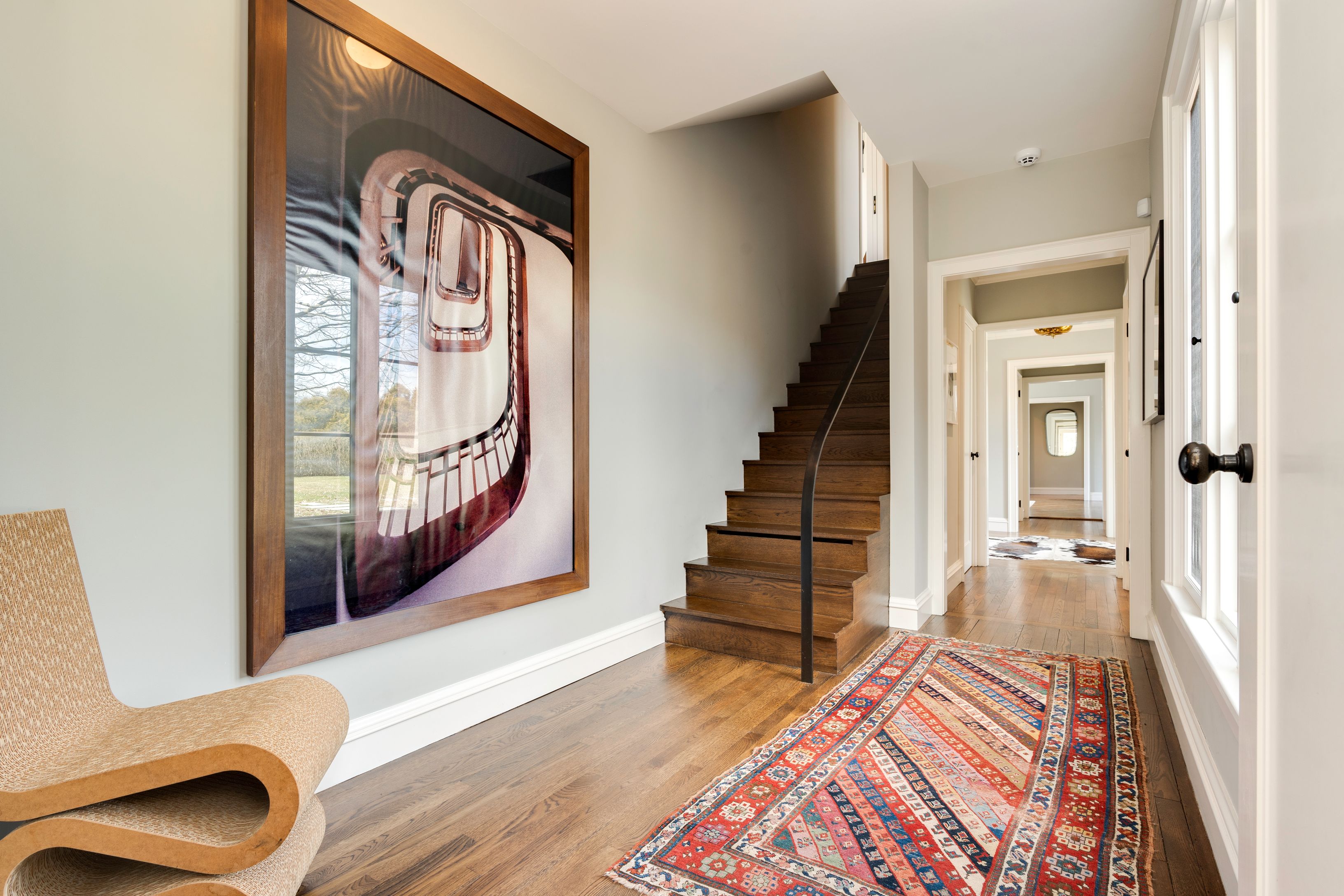 153 Egypt Lane East Hampton, NY 11937 - Photo 22 of 47 a view of front door with wooden floor and a rug
