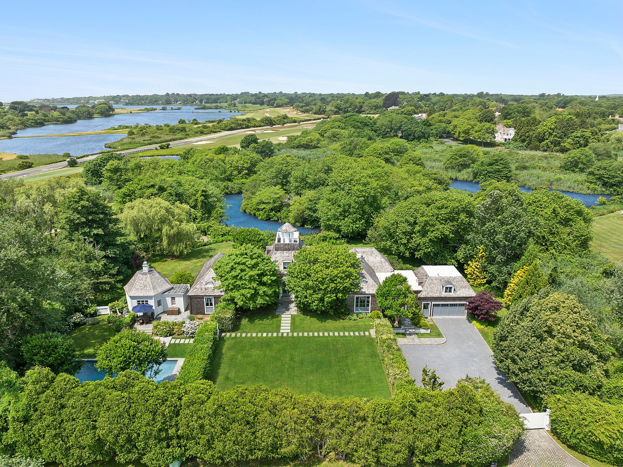 153 Egypt Lane East Hampton, NY 11937 - Photo 3 of 47 an aerial view of a houses with outdoor space and trees all around