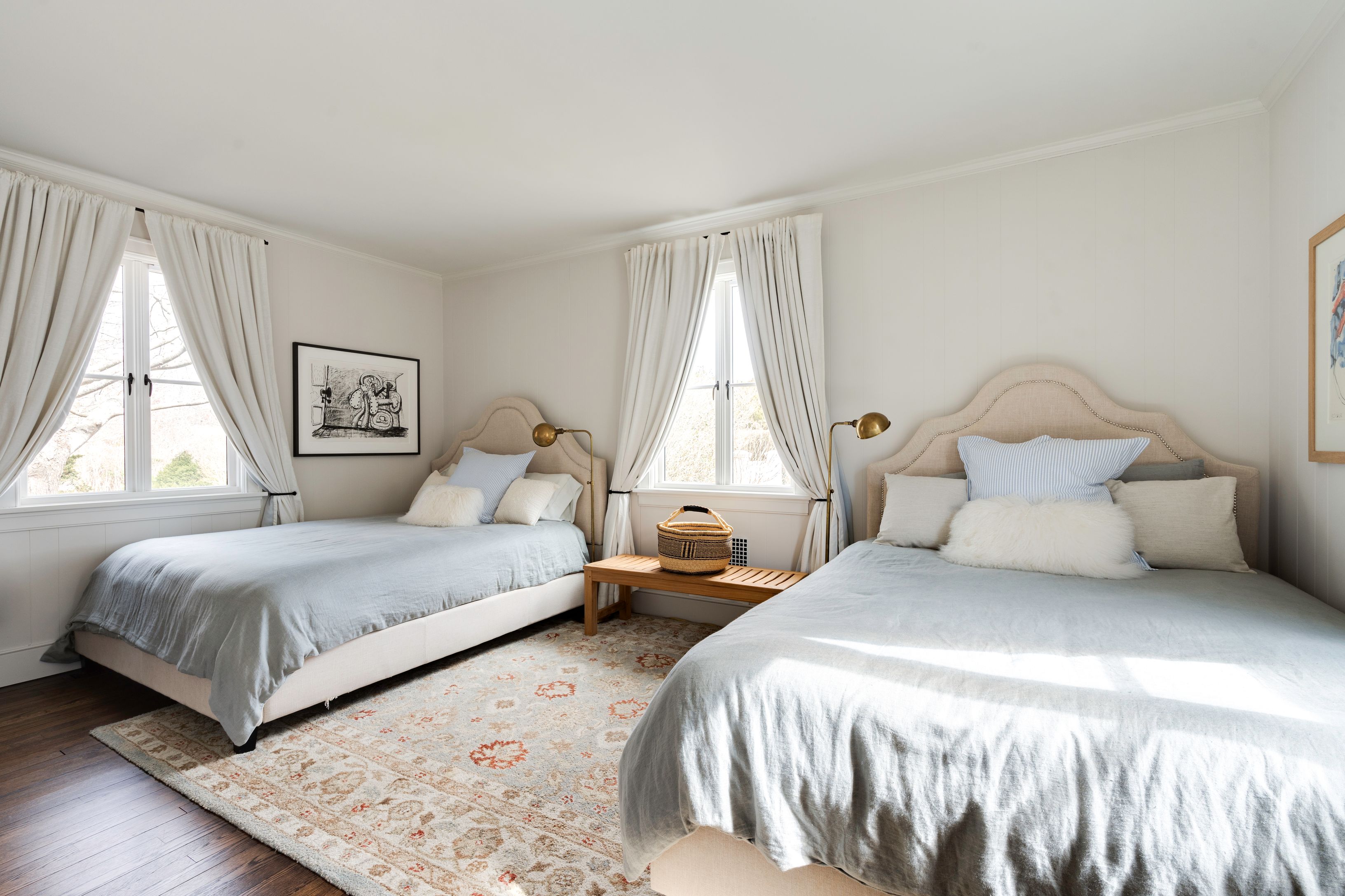 153 Egypt Lane East Hampton, NY 11937 - Photo 31 of 47 a bedroom with a bed and wooden floor