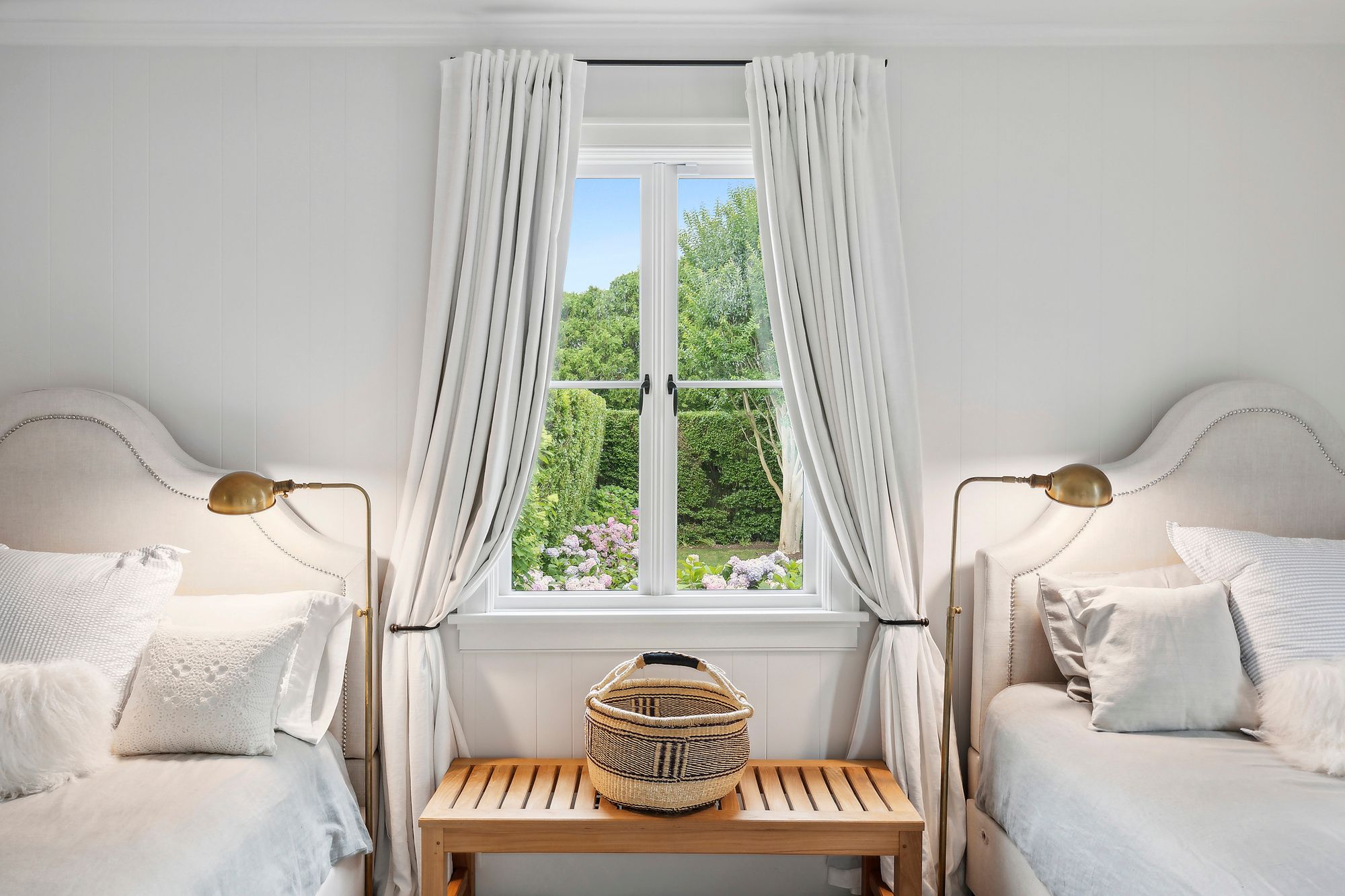 153 Egypt Lane East Hampton, NY 11937 - Photo 32 of 47 a view of a bedroom with a bed and a window