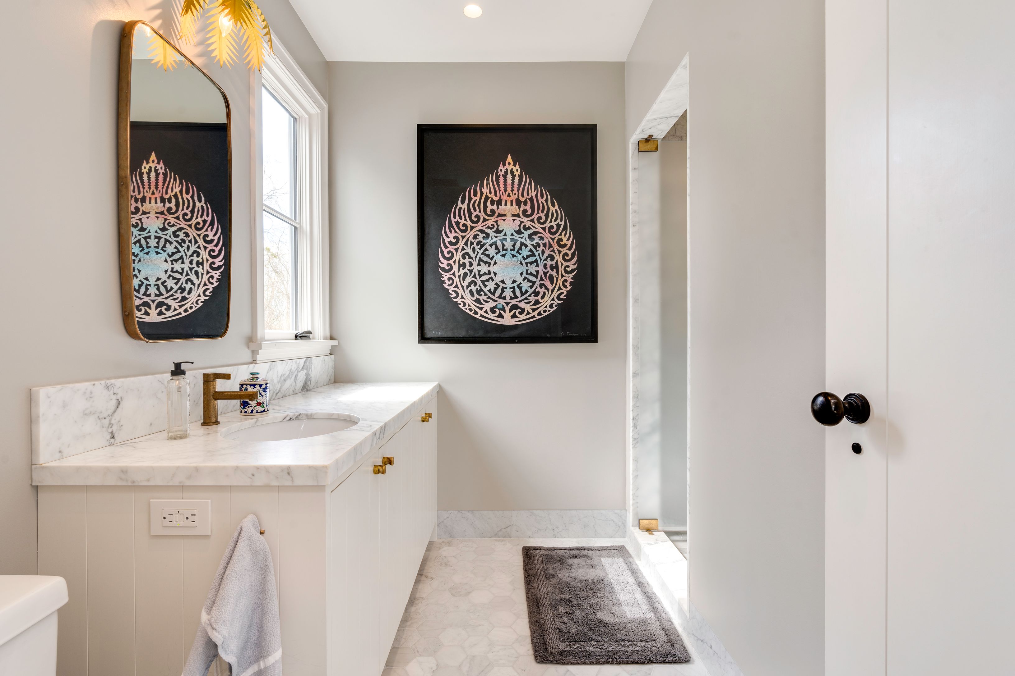 153 Egypt Lane East Hampton, NY 11937 - Photo 33 of 47 a bathroom with a sink and a mirror