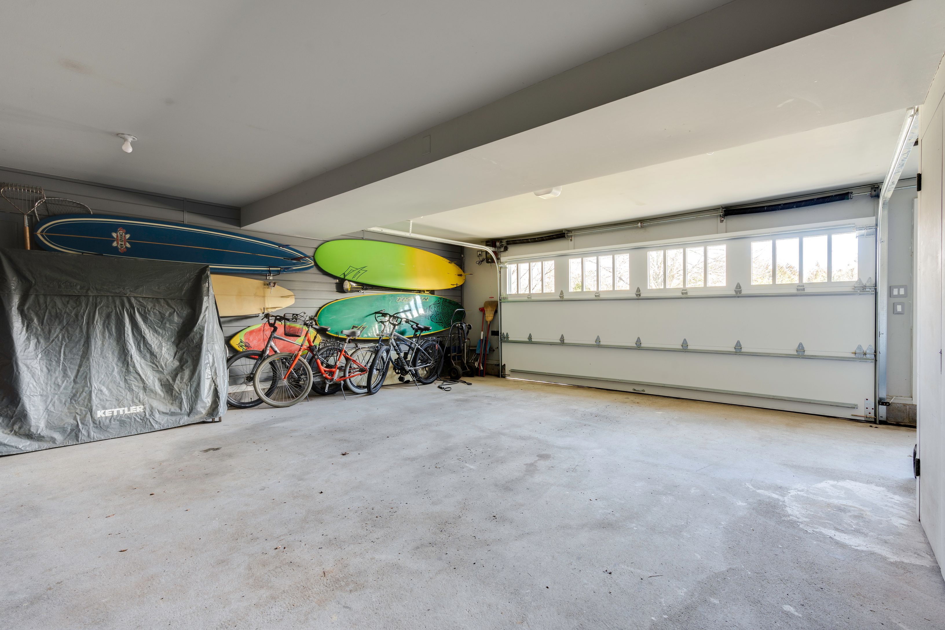 153 Egypt Lane East Hampton, NY 11937 - Photo 41 of 47 an empty room with window and flowerpot