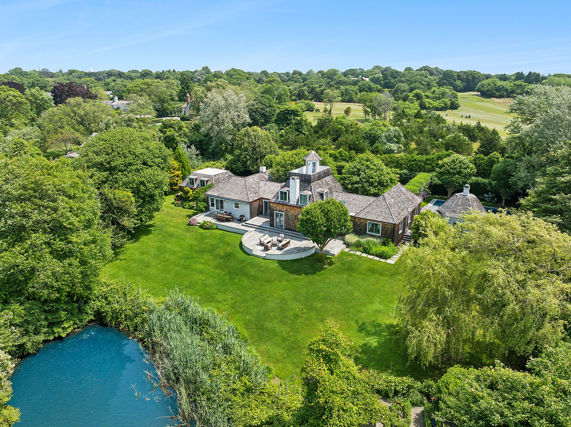 153 Egypt Lane East Hampton, NY 11937 - Photo 5 of 47 an aerial view of a house with a yard