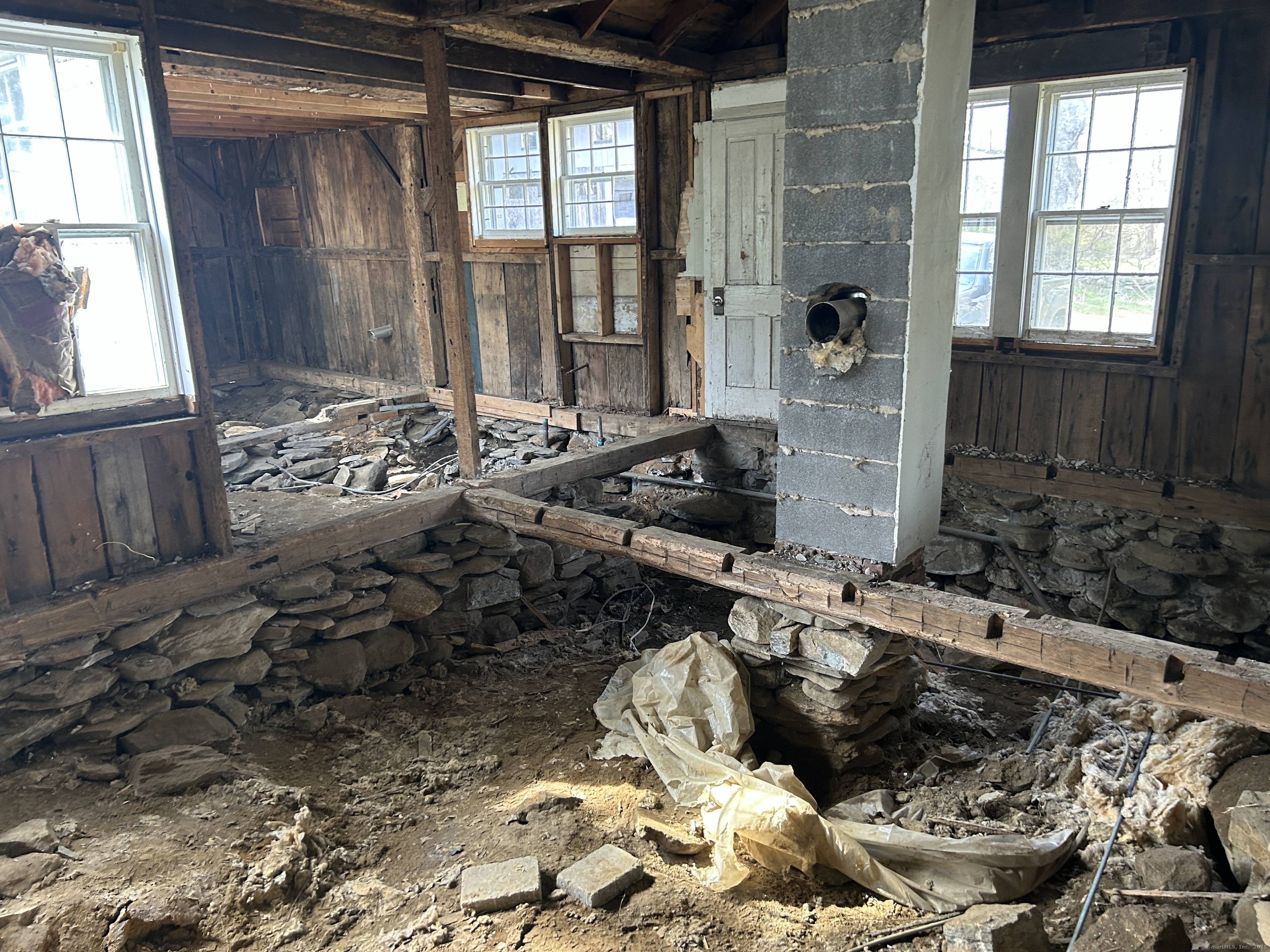 297 Main Street Hampton, CT 06247 - Photo 11 of 16 a bathroom with a granite countertop window and a shower