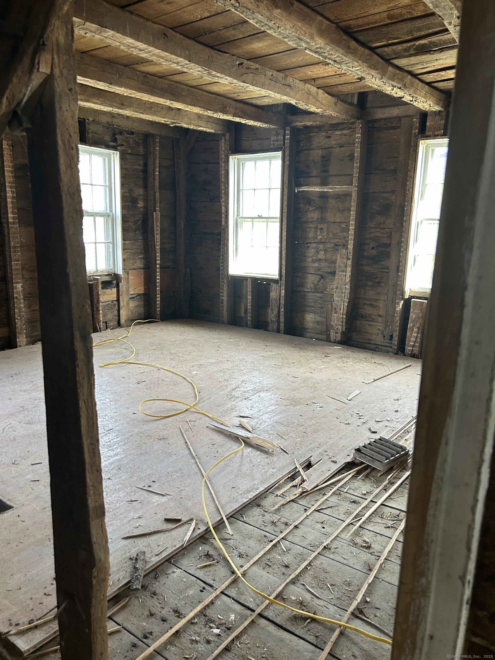 297 Main Street Hampton, CT 06247 - Photo 13 of 16 an empty room with windows