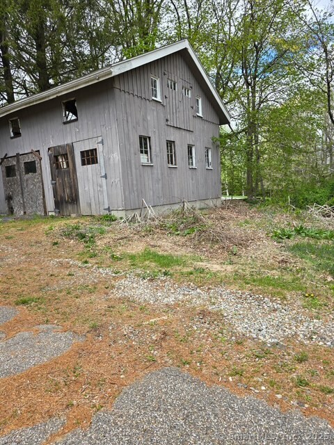 297 Main Street Hampton, CT 06247 - Photo 2 of 16 a house with a outdoor space