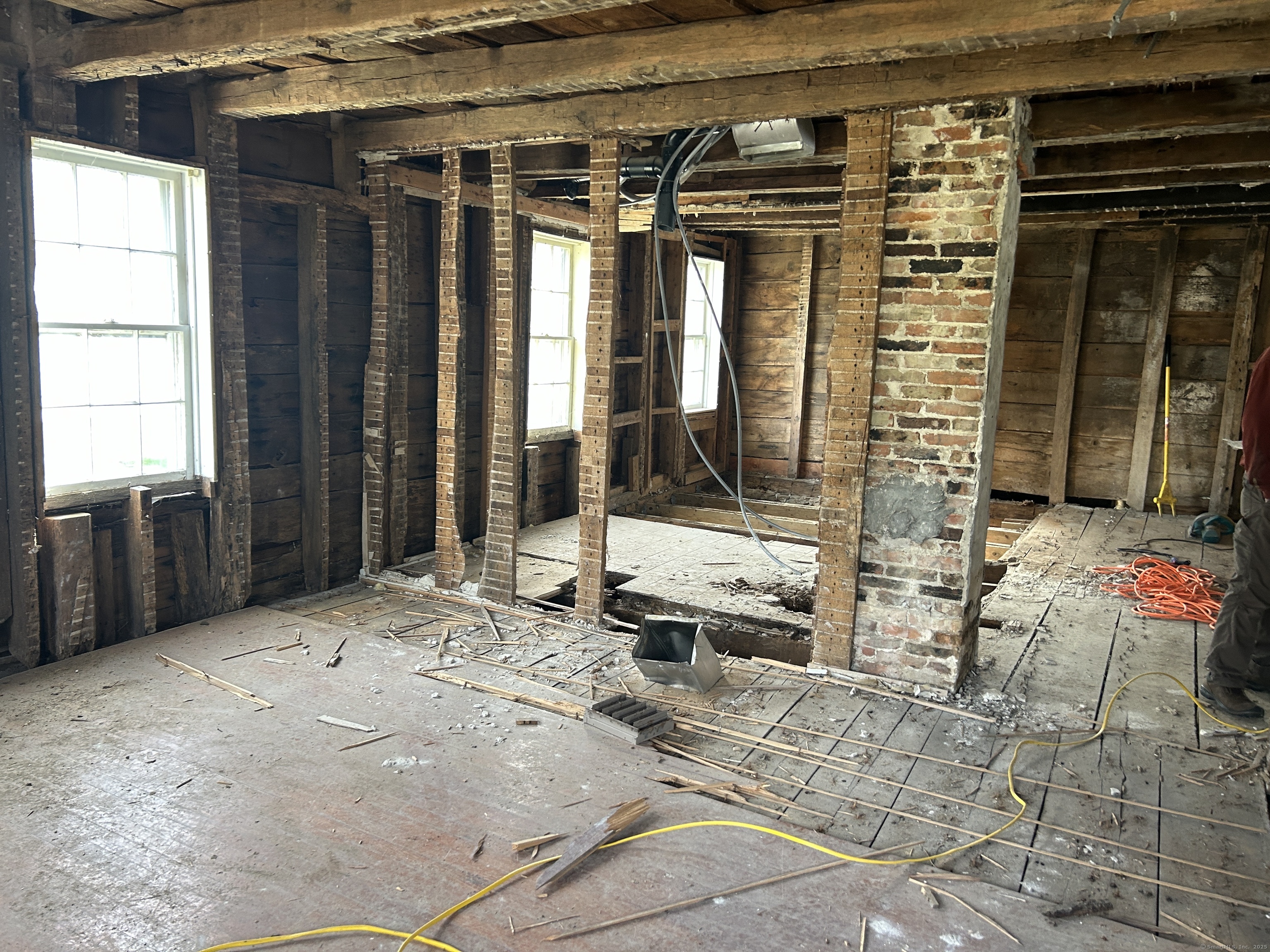 297 Main Street Hampton, CT 06247 - Photo 10 of 16 a view of a porch with a table and chairs and potted plants