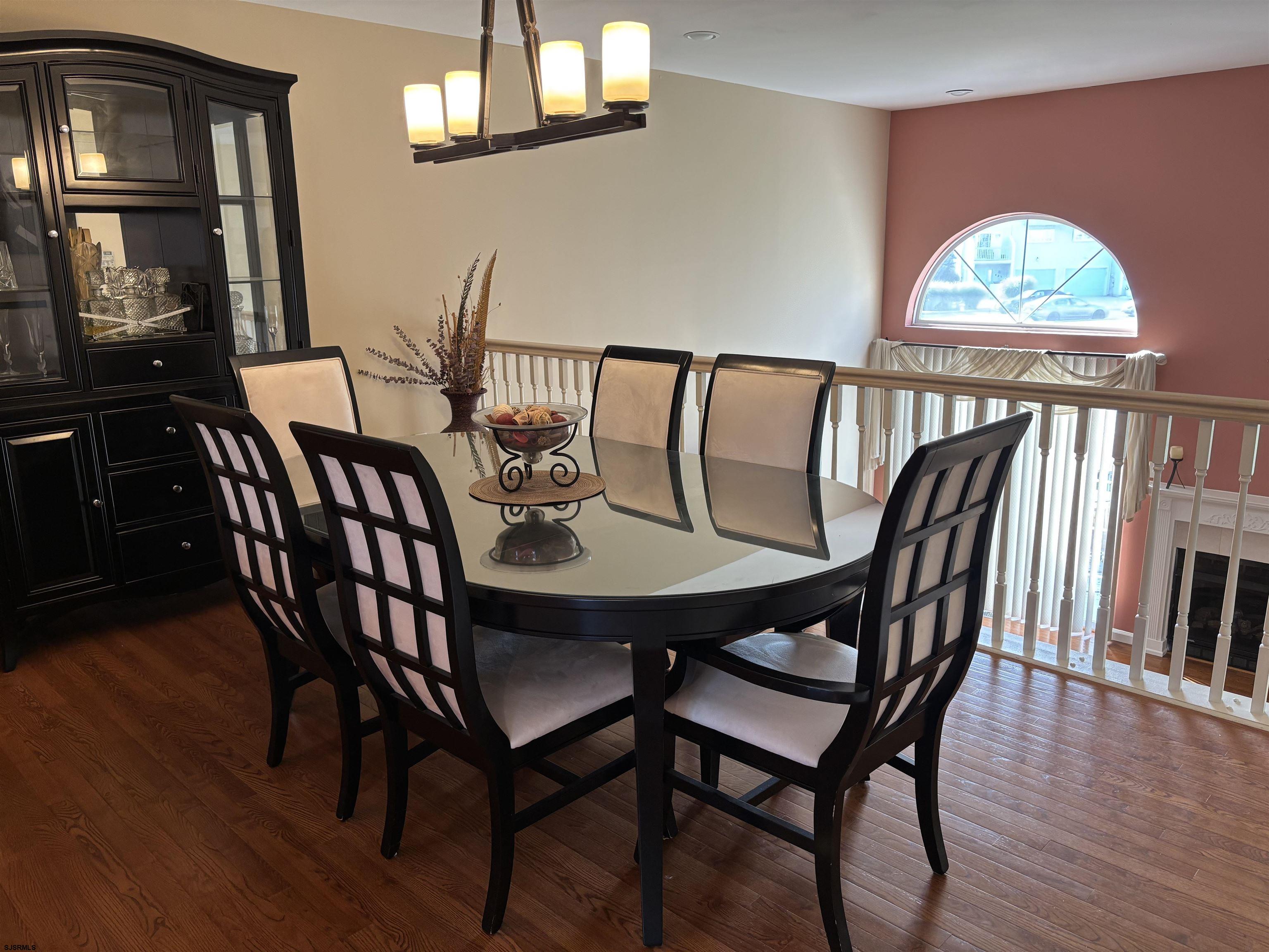 66 Sailfish Drive Brigantine, NJ 08203 - Photo 13 of 24 a view of a dining room with furniture and wooden floor