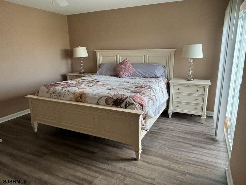 66 Sailfish Drive Brigantine, NJ 08203 - Photo 20 of 24 a bedroom with a bed and a night stand