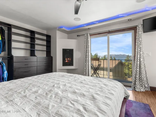 a bathroom with a double vanity sink mirror and toilet