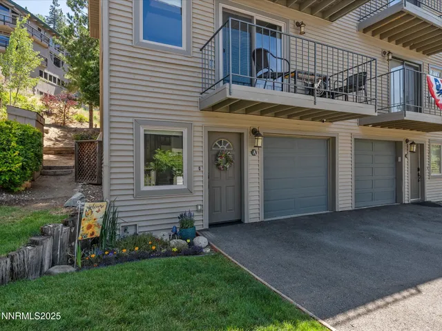a kitchen with a stove top oven sink and cabinets