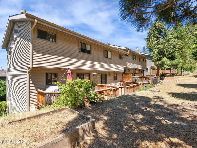 a view of a city with mountains in the background