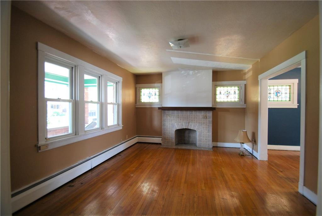 355 Gross Street Pittsburgh, PA 15224 - Photo 4 of 25 Solid Oak floors. Carpets were just picked up.