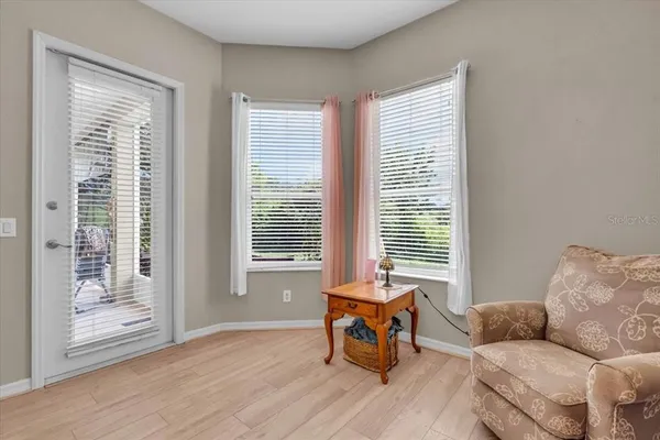 a living room with furniture and a window
