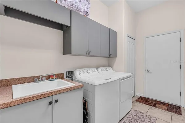 a utility room with a sink