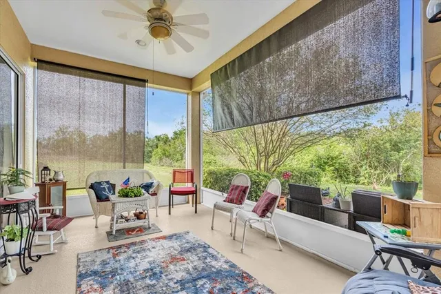 a living room with furniture and a window