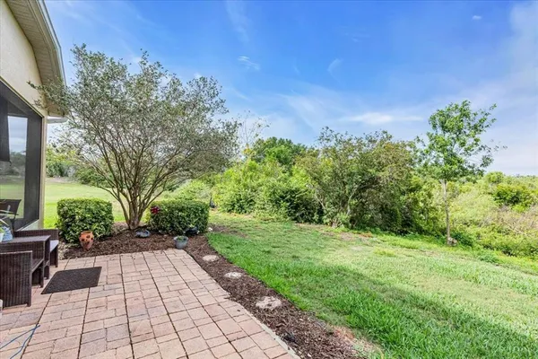 a view of a pathway with a yard