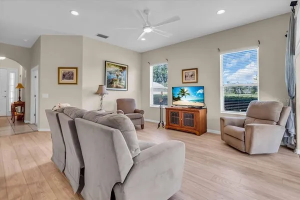 a living room with furniture and a window