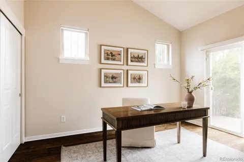 a view of a workspace with furniture