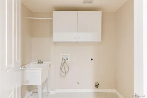 a bathroom with a bathtub and mirror