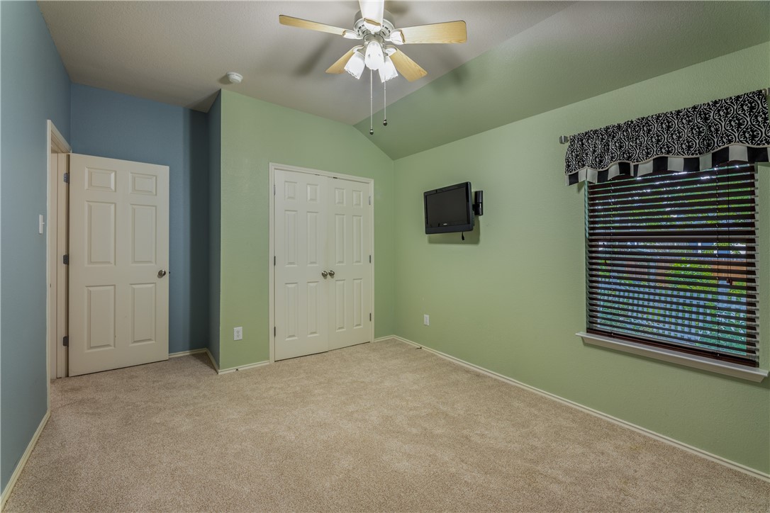 114 Inman Drive Hutto, TX 78634 - Photo 11 of 20 a view of an empty room with a window