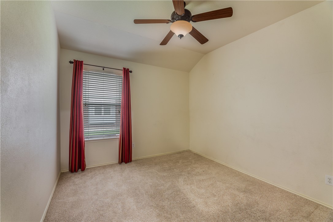 114 Inman Drive Hutto, TX 78634 - Photo 12 of 20 an empty room with closet and windows