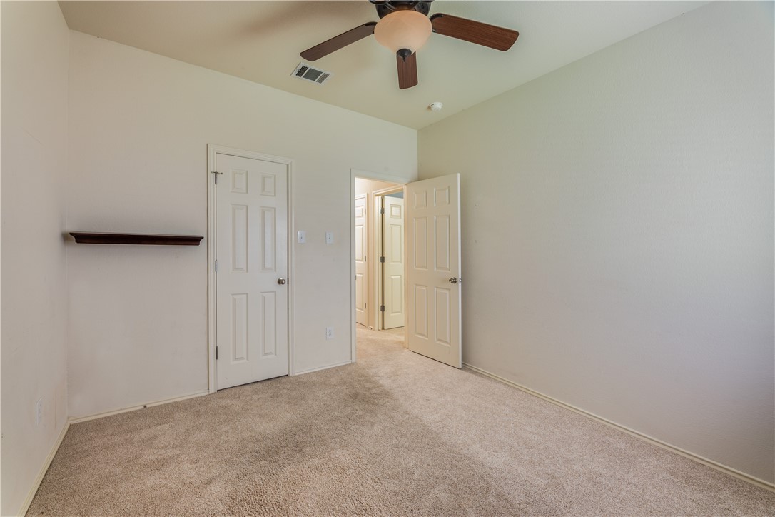 114 Inman Drive Hutto, TX 78634 - Photo 13 of 20 en empty room with fan