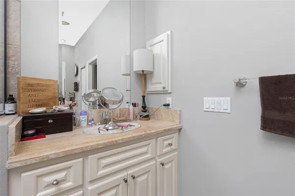 a utility room with sink dryer and washer