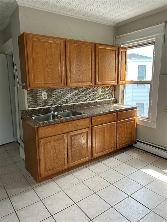 80 Cochran Street, Unit 3L Chicopee, MA 01020 - Photo 3 of 8 a kitchen with stainless steel appliances granite countertop a sink and a stove