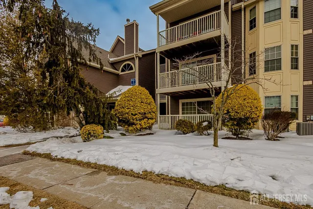 front view of a building with many windows