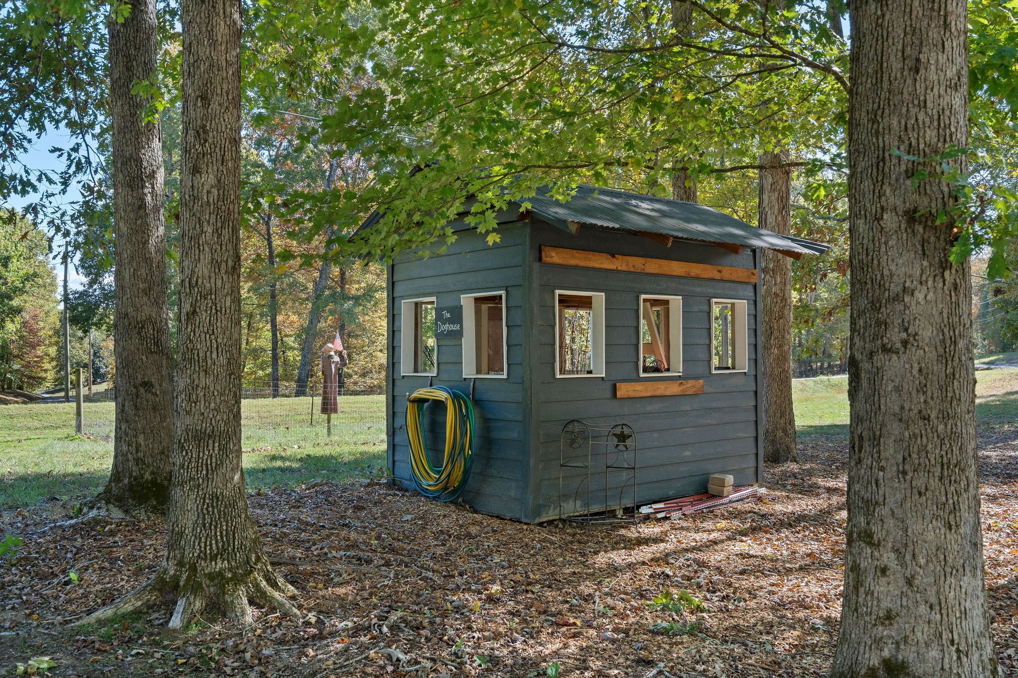 5616 Pinewood Road Franklin, TN 37064 - Photo 80 of 82 a view of a small house with a tree in the forest