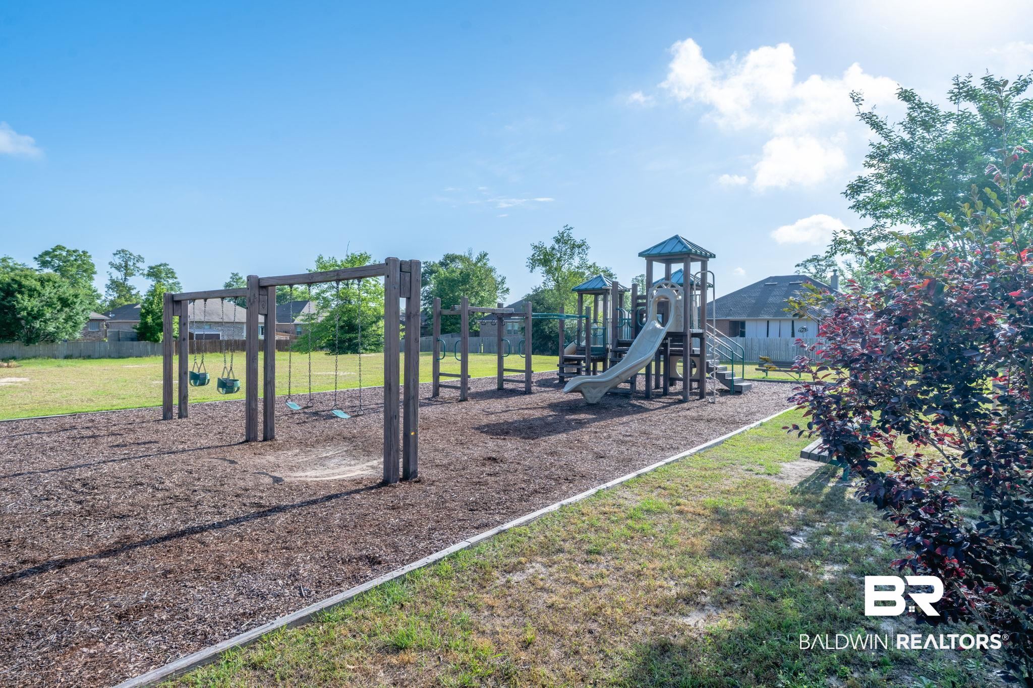 2183 Meadowview Loop Semmes, AL 36575 - Photo 58 of 58 Communal playground featuring a lawn