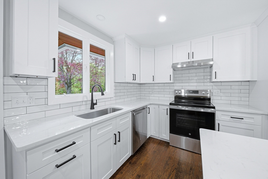 1 Ayrshire Road Worcester, MA 01604 - Photo 6 of 41 a kitchen with a sink stove and cabinets