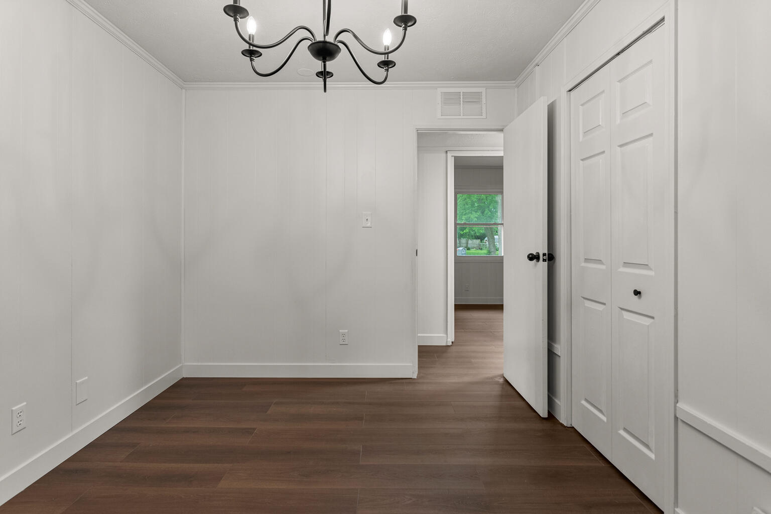 1802 Meadow Drive Champaign, IL 61821 - Photo 24 of 30 a view of a room with wooden floor fan and windows