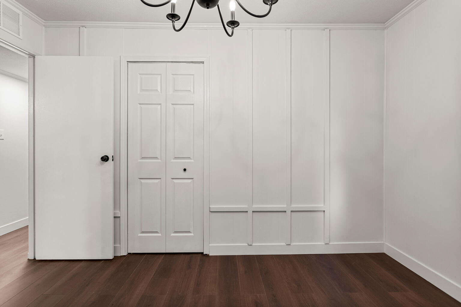 1802 Meadow Drive Champaign, IL 61821 - Photo 25 of 30 a view of an empty room with wooden floor