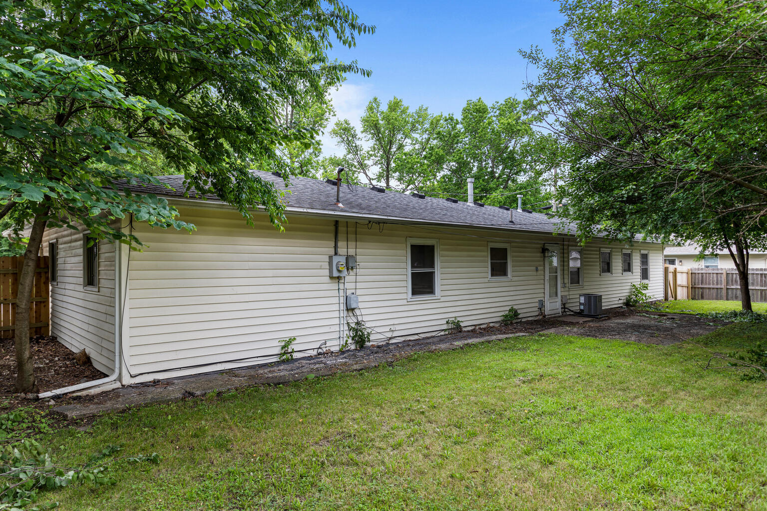 1802 Meadow Drive Champaign, IL 61821 - Photo 28 of 30 a front view of a house with a garden