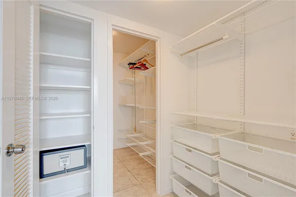 a bathroom with a sink toilet vanity and shower