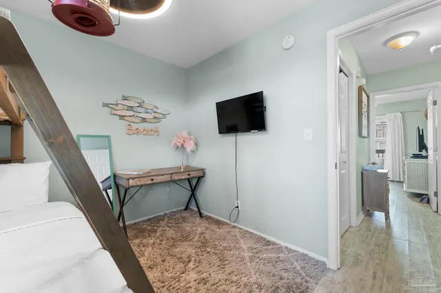 a view of a livingroom with furniture and a couch