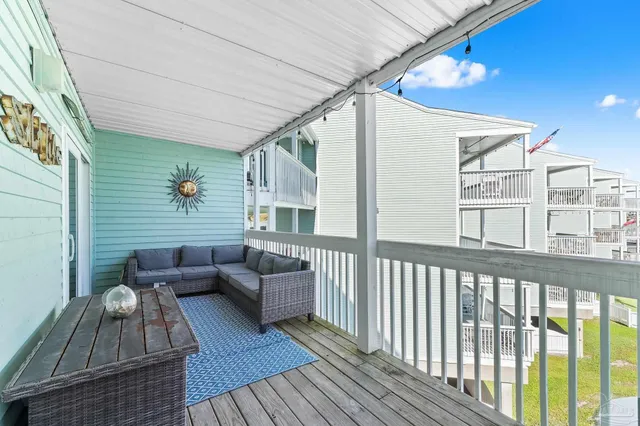 a view of a balcony with couch